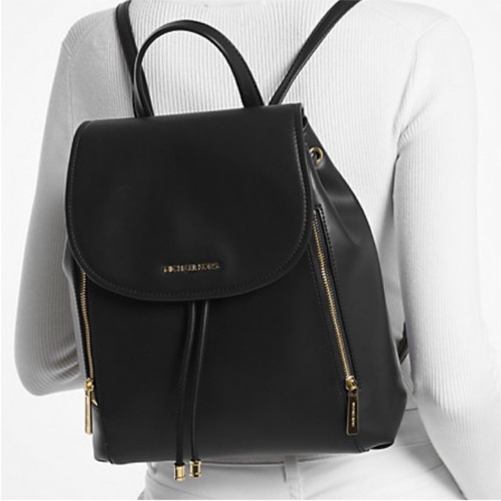 Michael Kors Black Leather
Backpack with Gold Hardware - Picture 2 of 14